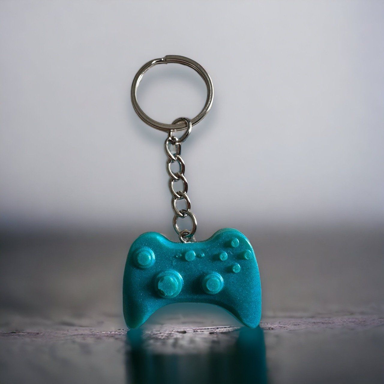 Porte clés manette xBox bleu turquoise